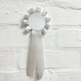 SILVER ROSETTE BADGE